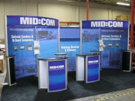 Modified ECO-2029 w/ Modified ECO-5C Podiums, Paradise Fabric Graphics (100% Recycled Content), and LED Lighting -- Image 1