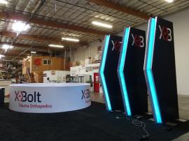 (3) Double-sided Towers with SEG Fabric Graphics, Printed Wings, and LED RGB Lighting and (1) Aero Overhead Hanging Sign (15' Dia. x 4' H) -- View 3