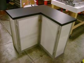 L-Shaped Counter with Two Doors, Storage, and Crate