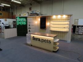 Custom Inline Exhibit with Halo Lit 3D Letters, Pendant Lights, Custom Reception Counter with Locking Storage, Acrylic Box, Shelves, Closet Storage, and Puck Lights
