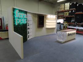 Custom Inline Exhibit with Halo Lit 3D Letters, Pendant Lights, Custom Reception Counter with Locking Storage, Acrylic Box, Shelves, Closet Storage, and Puck Lights -- View 2
