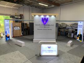 RENTAL: Island Design with Gravitee Storage Tower at 118" Wide x 72" Deep x 142.5" High, with Locking Door, Custom Laminated Storage Tower Soffit with Recessed Puck Lighting, (2) 4' Wide x 10' High Double-Sided Lightboxes, Edge Accent Lighting, (2) Ceilin