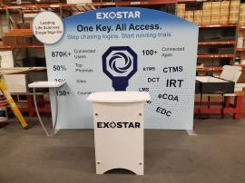 Modified SYK-1026 Symphony Portable Display with Floating Graphic, SEG Fabric Graphic, SYM-406 Portable Counter with Locking Storage, and Workstation with Wireless Charging Pad