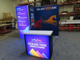 GK-1016 Gravitee Modular Exhibit with SEG Fabric Graphics, SuperNova Lightbox, Monitor Mount, Locking Closet Storage, and GOD-1557 Counter with Locking Storage