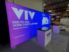 RE-2046 Inline Design with (2) Single-Sided Lightboxes at 114" Wide x 95" High, (2) RE-1202 Reception Counters -- View 2