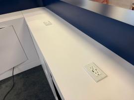 Custom U-shaped Bar with LED Lights, Electrical Outlets, and Locking Storage, Stage with RGB LED Lights, Hanging Circular Sign, MOD-1732 Genius Bar, and (4) ECO-8K Stands -- View 5