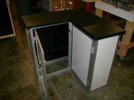 L-Shaped Counter with Two Doors, Storage, and Crate